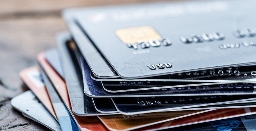 credit cards stacked on table
