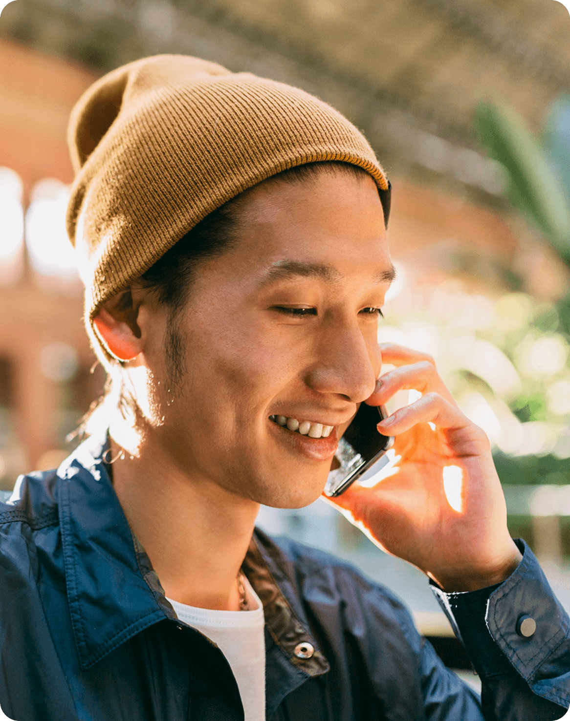 Asian man talking on phone