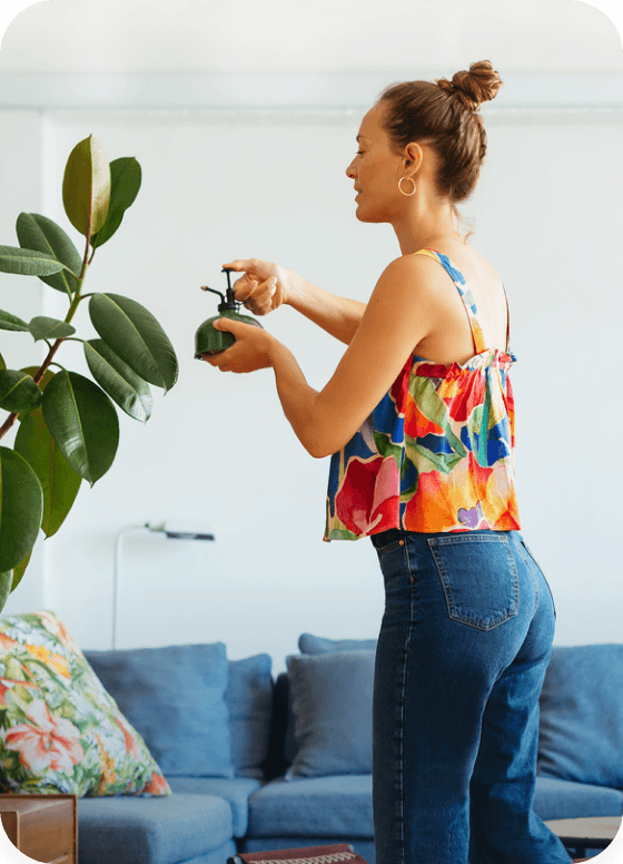woman watering plant